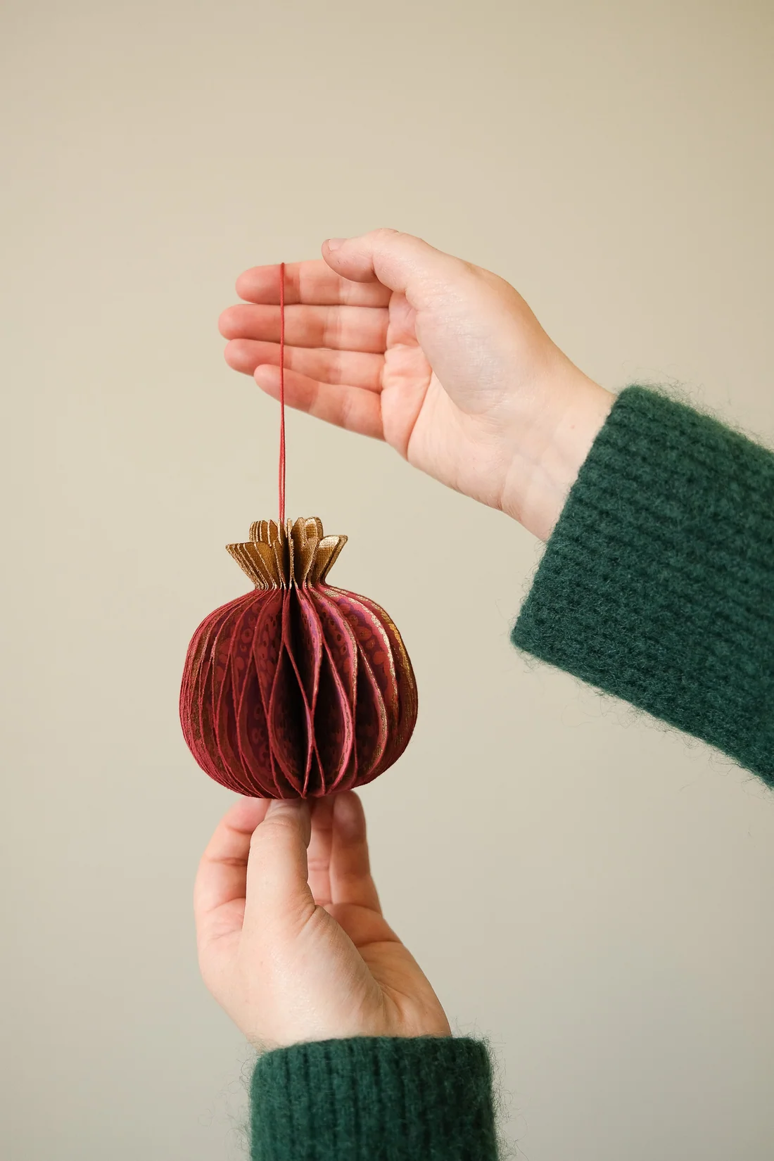Pomegranate Honeycomb ornament by east End Press